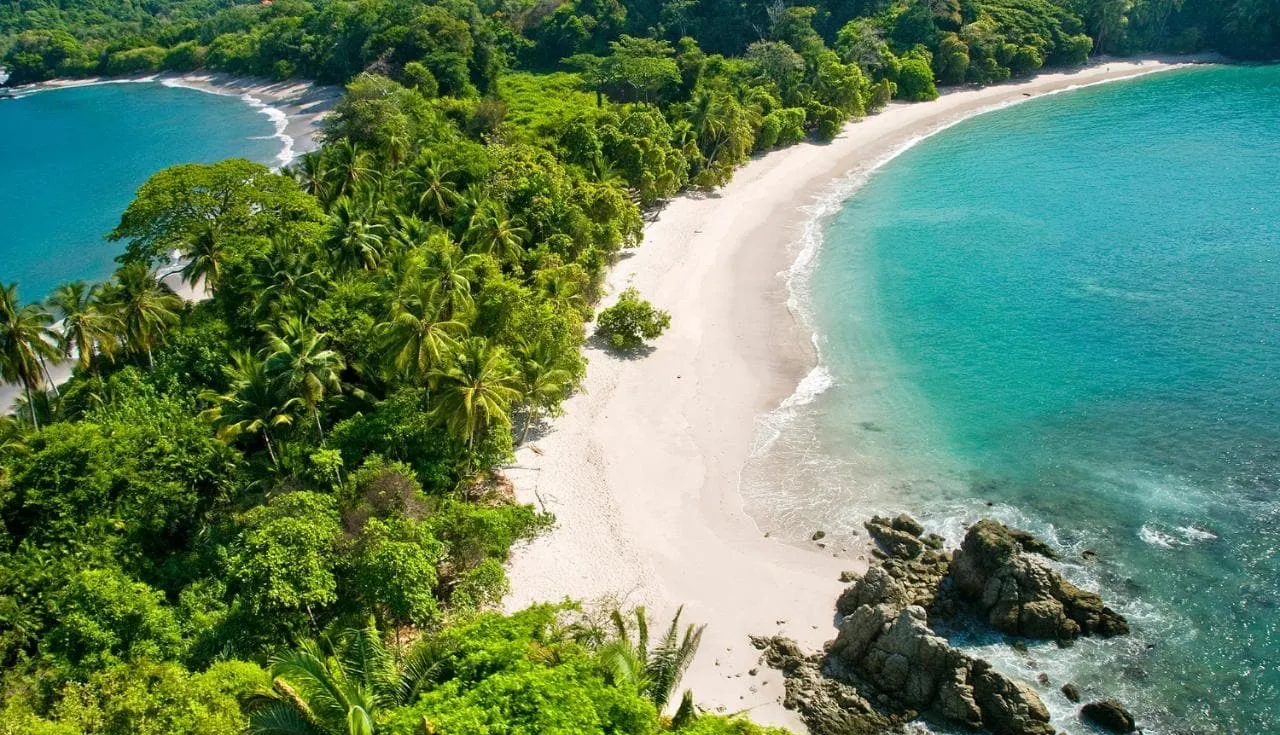 Manuel Antonio beach framed by rainforest, Central Pacific
